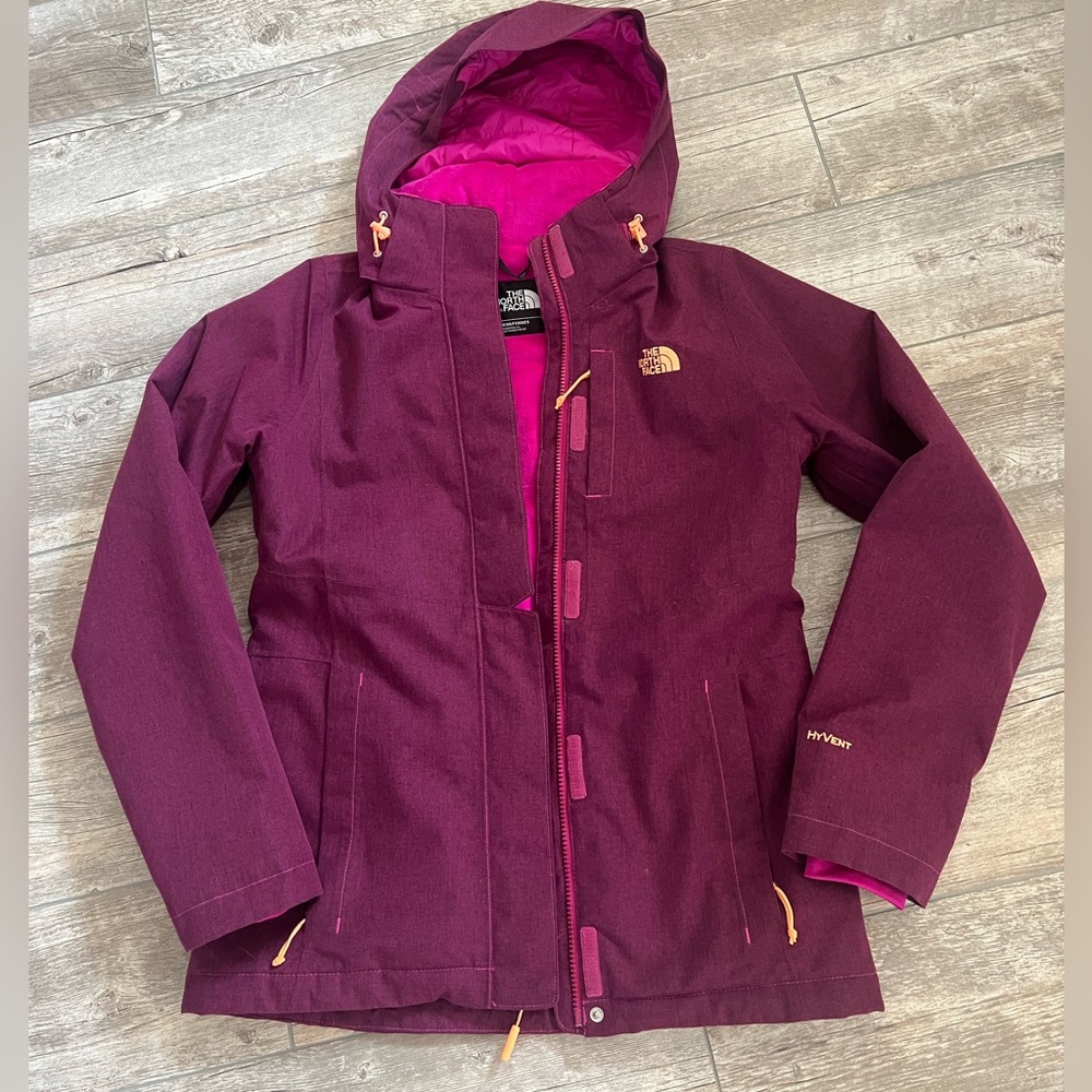 The North Face maroon/pink women’s size small lined ski jacket.